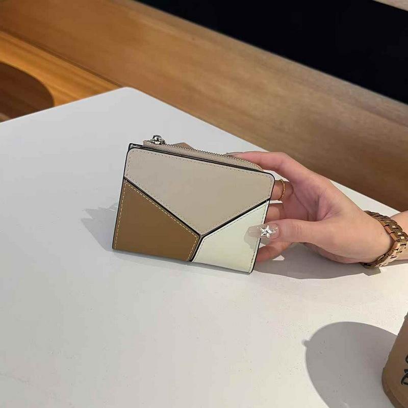 2025 New Genuine Leather Wallet Head Layer Leather Women's Handbag Short Style Simple Color Contrasting Geometric Splicing Women's Wallet