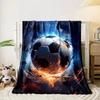 A fiery soccer ball surrounded by intense glowing flames and debris. for all seasons blanket lunch break throw gift