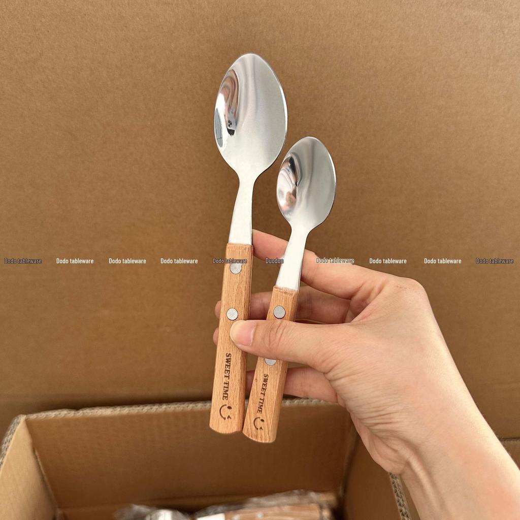 Stainless Steel Cutlery Set with Wood Handles and Smiley Logo - Knife, Fork, Spoon for Desserts and Dining.