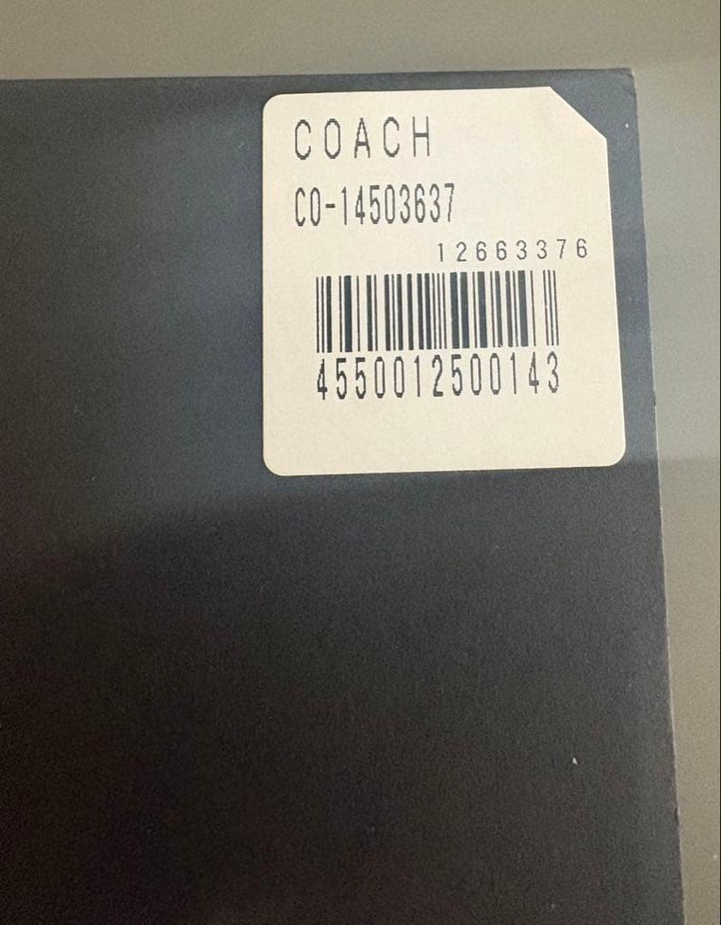 Серебряные часы COACH с декоративными элементами из камней.