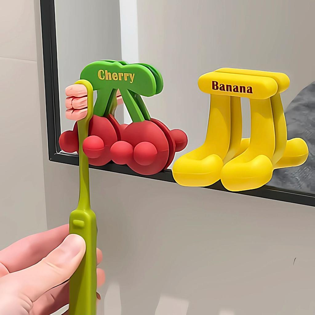 1PC Fruit-themed toothbrush holder for home bathrooms: wall-mounted, adhesive organizer rack for electric toothbrushes and dental care items.