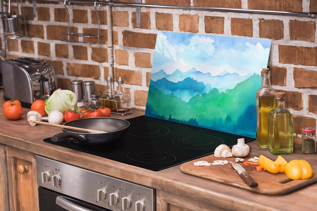 Glass protective plate for the stove 70x52 Mountains