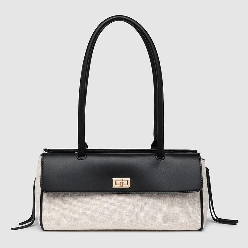 Fashion woven hand-held women's bag, shoulder underarm bag, high-end temperament baguette bag.