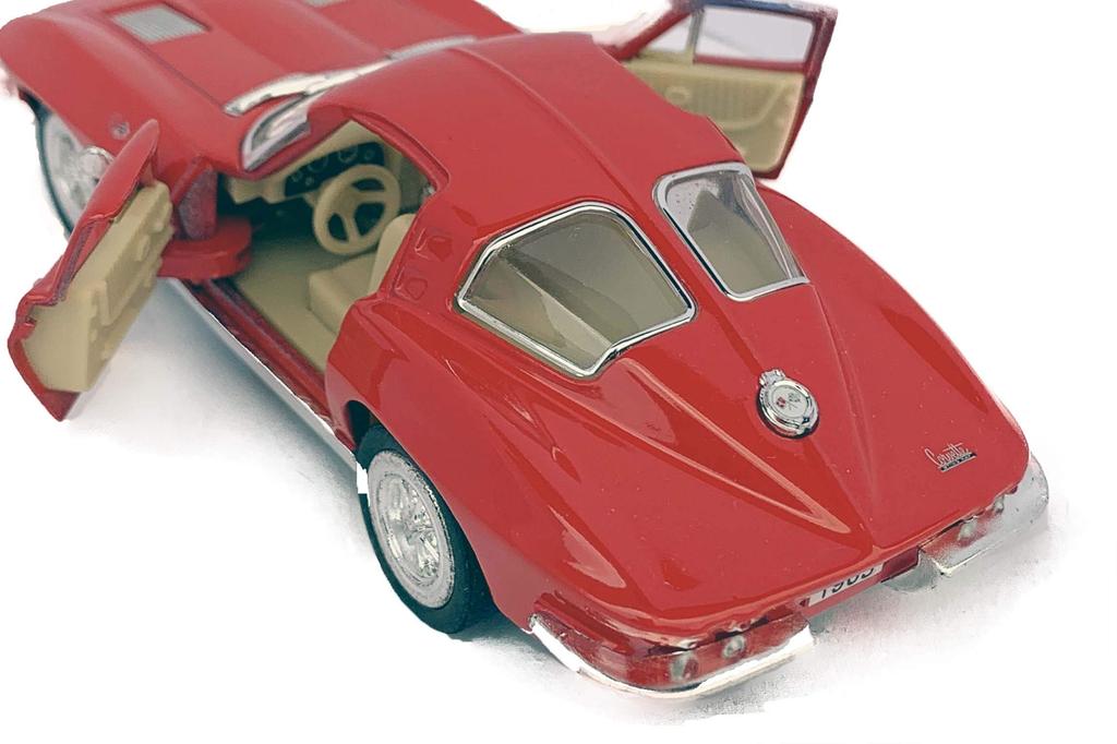 Kinsmart 1963 Corvette Stingray Машинка-миниатюра с инерционным механизмом 1/36 (красный)