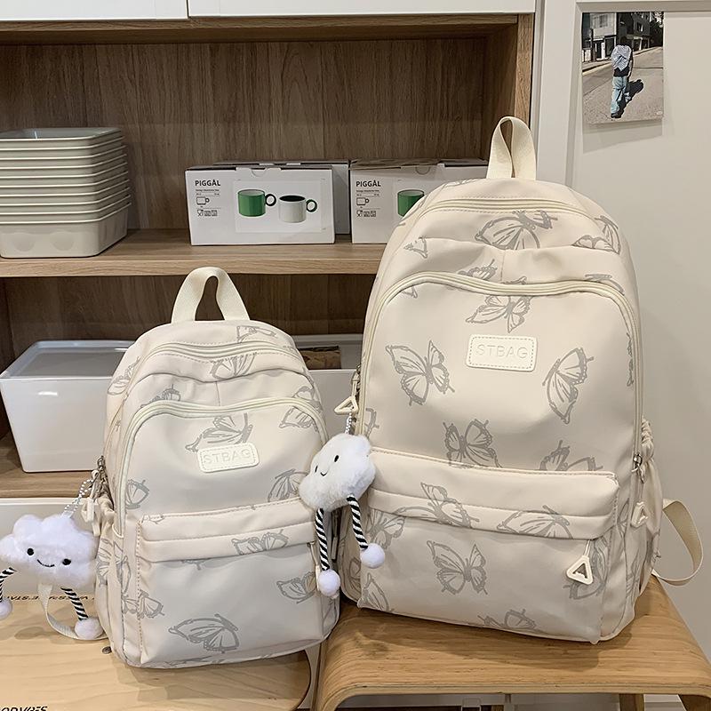 Рюкзак с принтом бабочек на два плеча для студентов, модель 2025 года - нишевый дизайн для девочек среднего, старшего школьного и студенческого возраста.