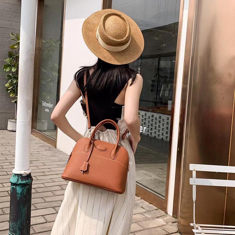 New Lychee Pattern Platinum Baotou Layer Leather Shell Bag Single Shoulder Diagonal Cross Leather Handheld Bowling Bag For Women