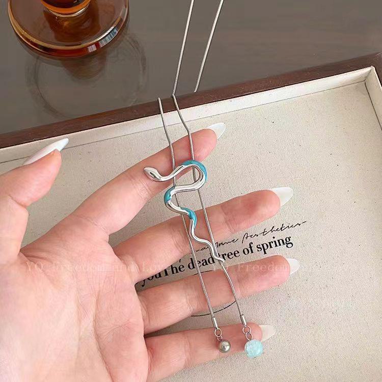 Серебряное выдвижное ожерелье-змея - Осень/Зима 2025 Легкая роскошь Цепочка для свитера для женщин