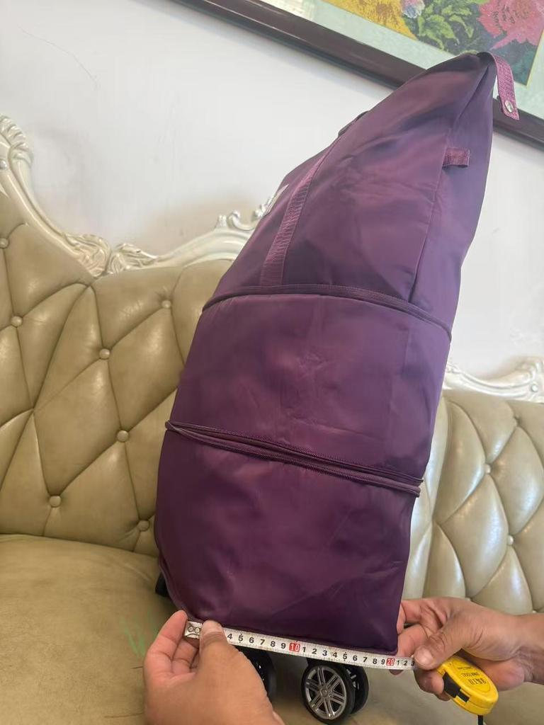 Дорожная сумка на колесах со складной ручкой