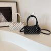 Super fire polka dot portable cylinder bag women's 2026 new Korean niche one-shoulder messenger bag versatile Boston bag