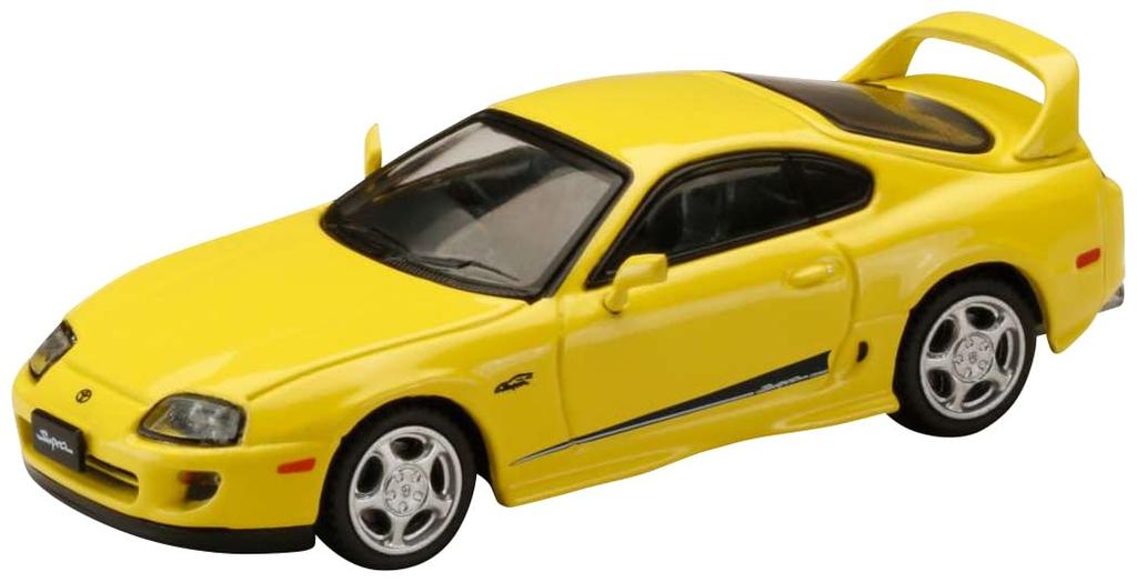 Автомобиль Toyota Supra RZ HJ64 с оригинальными опциями и активными спойлерами. Суперяркий желтый. Готовый продукт. Масштаб 1/64. (JZA80)