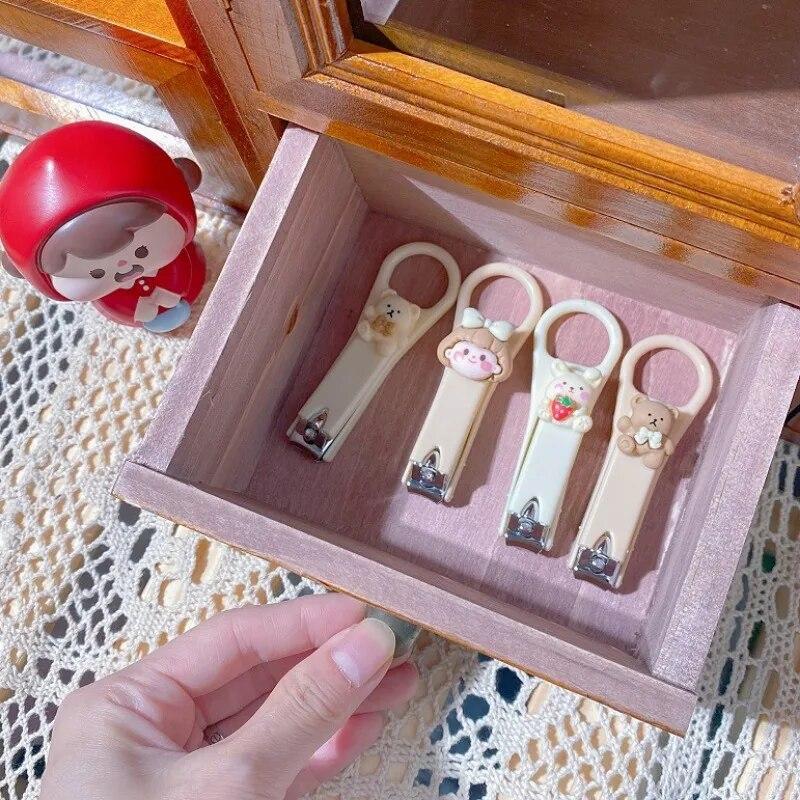 Новые милые кусачки для ногтей с милым мультяшным медведем и кроликом, триммер для ногтей с защитой от брызг, аксессуары для ухода за ногтями для детей, маникюрные инструменты