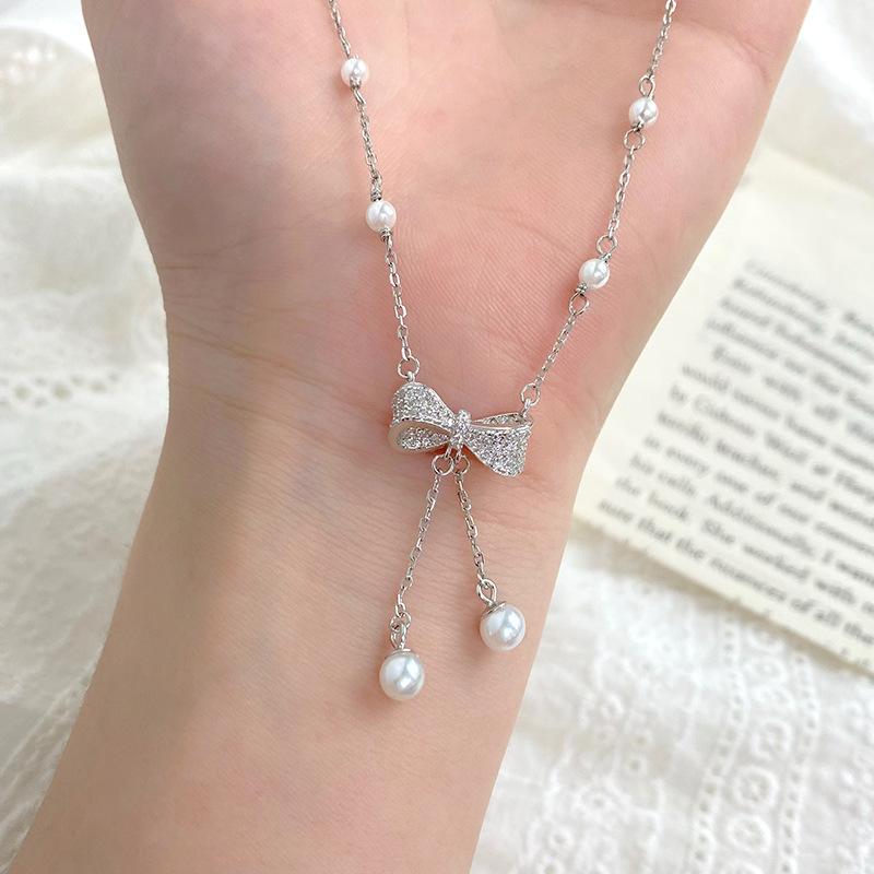 Легкое роскошное жемчужное ожерелье с бантом для женского меньшинства, элегантная и изящная ключичная цепочка