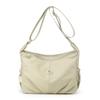 Элегантная сумка-слинг с мягкими плечами, верхняя застежка-молния, регулируемый ремень, геометрическая строчка и гладкая нейлоновая ткань для современного повседневного ношения и поездок на работу