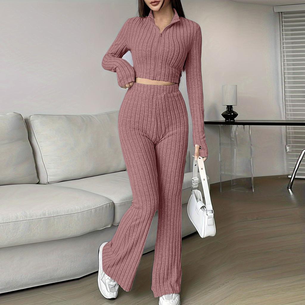 Женский модный однотонный ребристый костюм из двух частей с застежкой-молнией, коротким топом с длинными рукавами и расклешенными брюками с высокой талией