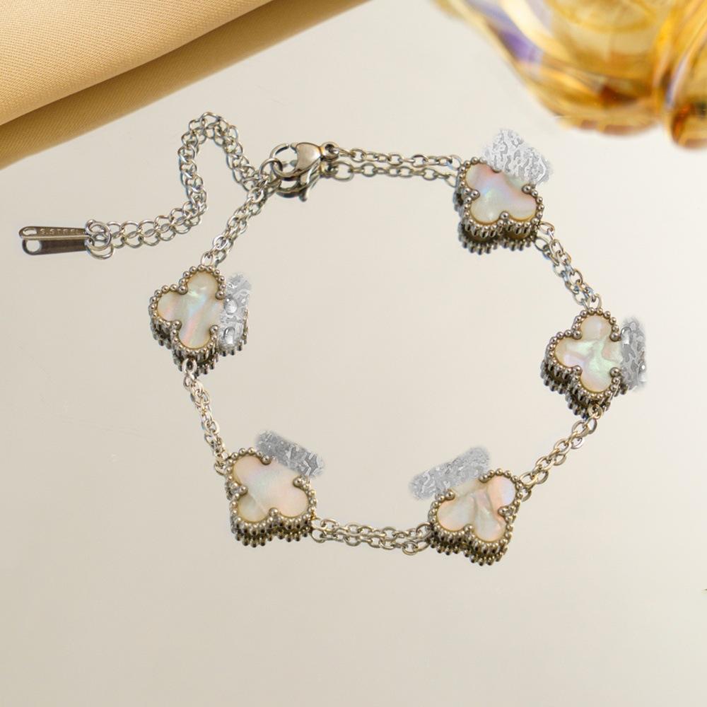 Браслет с градиентным четырехлистным клевером Роскошный и изысканный женский модный ювелирный аксессуар Уникальное и стильное украшение для руки