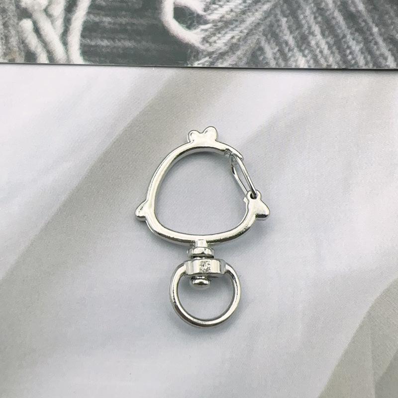 Handmade Metal Rotating Chick Keychain with Christmas Bell and Color Retention.