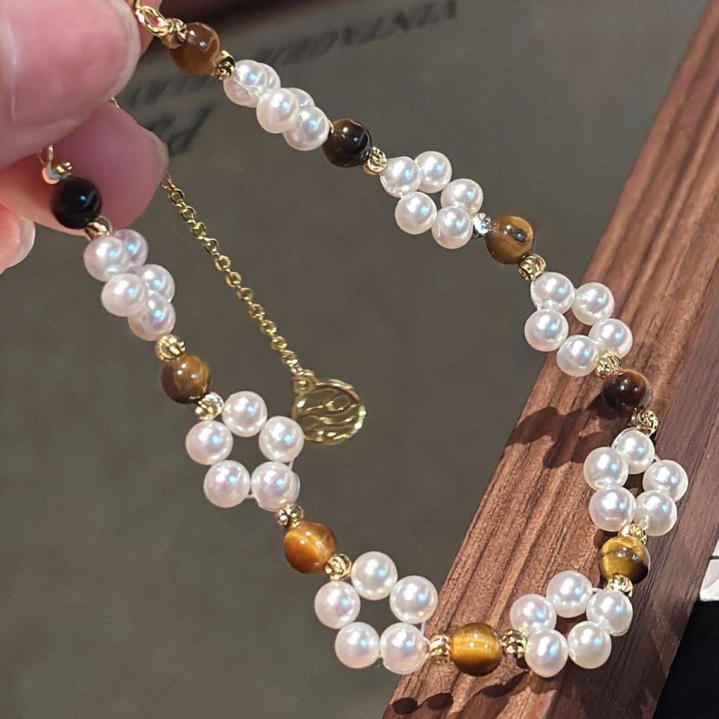 Hand-woven natural freshwater pearl bracelet women's 11k gold-wrapped high-end Maillard tiger eye niche ins jewelry