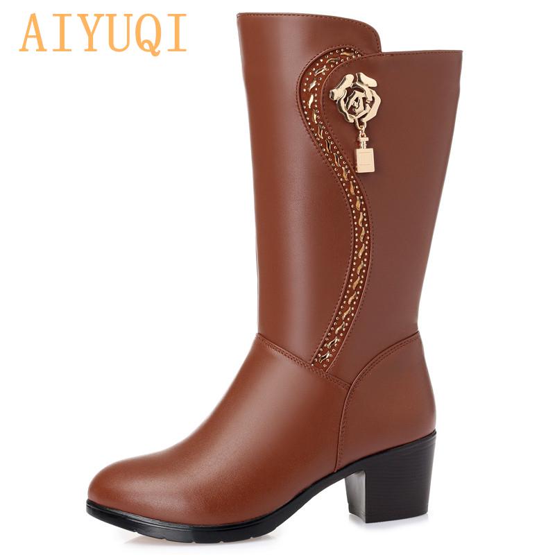 Женские зимние кожаные сапоги с подкладом из натуральной шерсти и искусственного пуха. Размер: 35-43