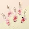 A lovely acrylic keychain with a lovely rupee