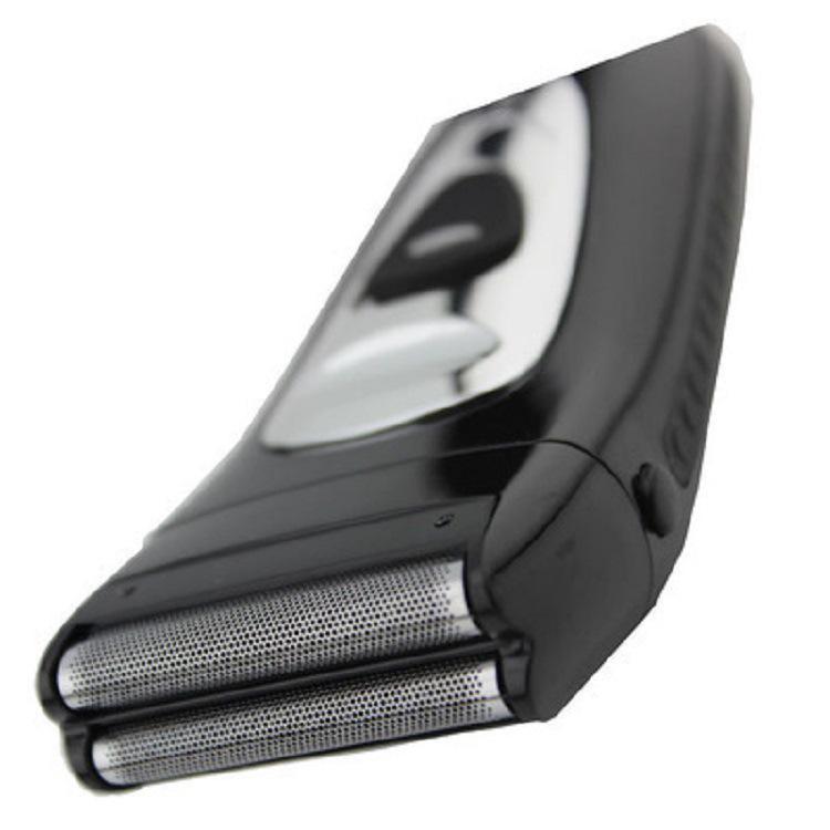 Корейская электробритва 1949 года, полностью моющаяся, с двумя головками возвратно-поступательного движения