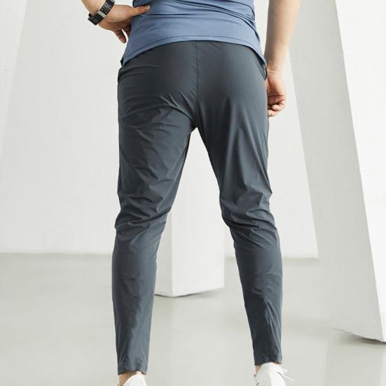 Men Jogging Pants Drawstring Elastic Waist Slim Fit Training Trousers with Pockets Solid