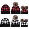 Three-Piece Black & Red Plaid Knit Hat Set with Detachable Double Pom-Pom for Christmas.