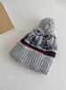Han Dai winter new Fair Island knitted wool hat retro cute hairball warm thickened ear protector cold hat
