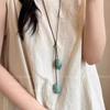 Retro Chinese Tassel Necklace: Unique Ethnic Style Women's High-End Clavicle Chain.