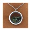 Pierres et Minéraux. Collier Tourmaline verte brut. Modèle Médaillon 25 mm. Couleur Argent.