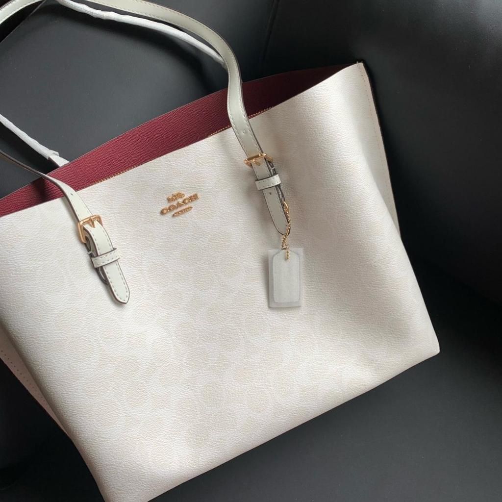 [Pre-Owned] Mollie Metallic Logo Signature Embossed Charm Tote Bag Shopping Bag Coated Canvas Smooth Leather Handheld Shoulder Bag 34 - New #16RC5FR
