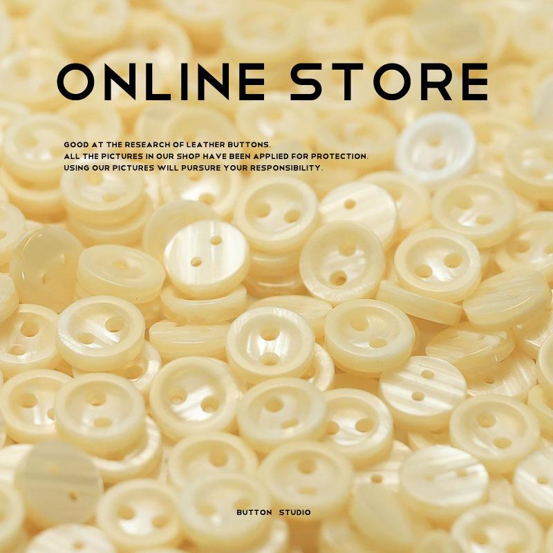 Пуговицы с двумя отверстиями Имитация ракушки Смола Ювелирные аксессуары Вязаный кардиган Пуговицы для воротника рукава Рубашка Одежда Пуговицы с длинным рукавом