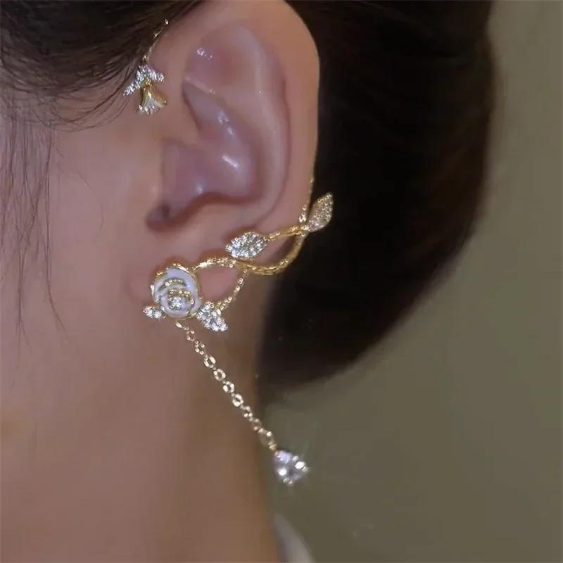 Изысканные серьги-клипсы в форме розы из легкой роскоши с хрустальными звездами и длинными кисточками