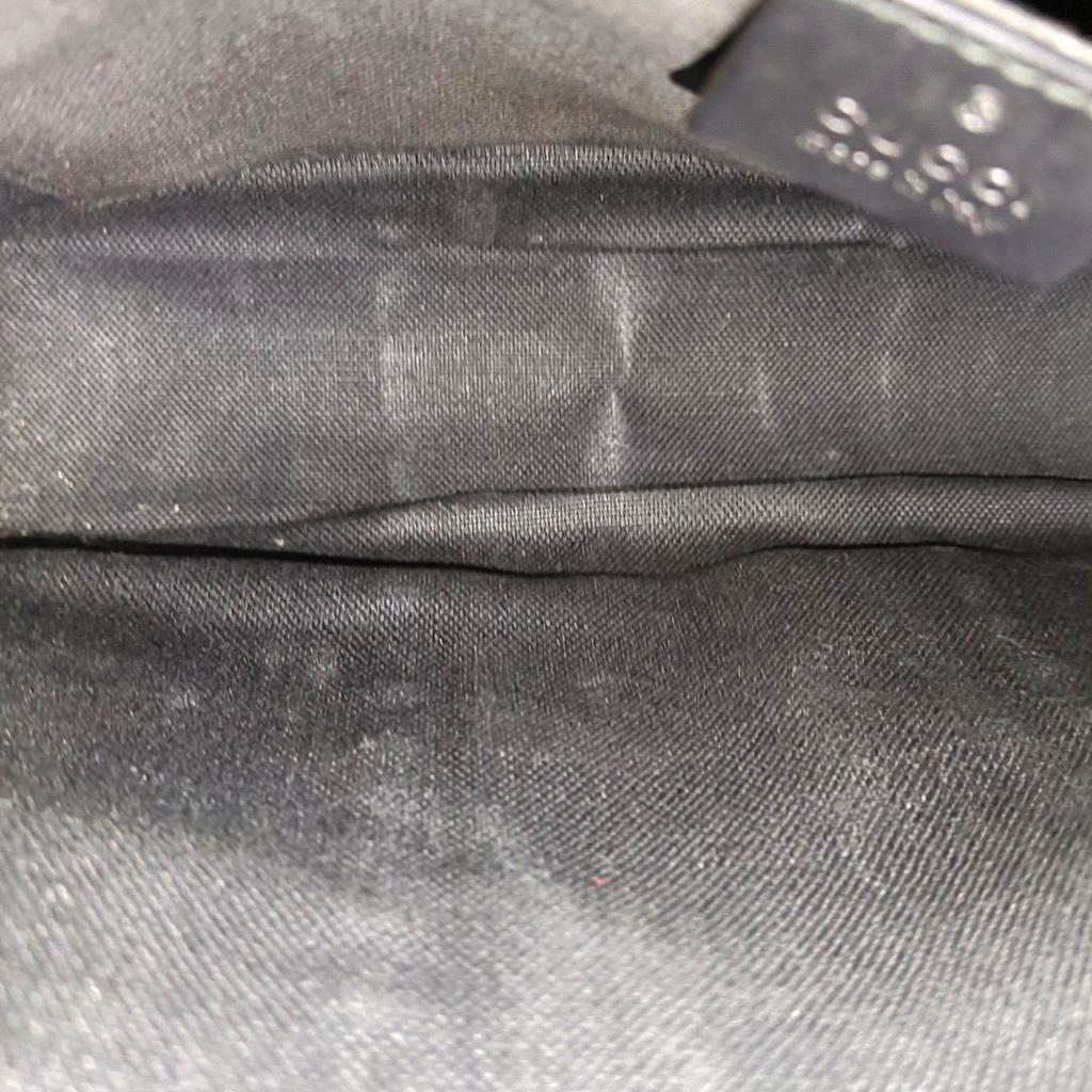 [Pre-Owned] Signature Logo Stripe Web Zipper Canvas Clutch - Very Good #XN4RTF