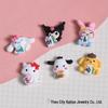 Набор аксессуаров для рукоделия с мультяшными персонажами Sanrio: Чехол для телефона Маджонг, Брелоки для Crocs, Стакан для воды, Клей-крем, Наклейки, Заколки для волос и Резинки для волос.