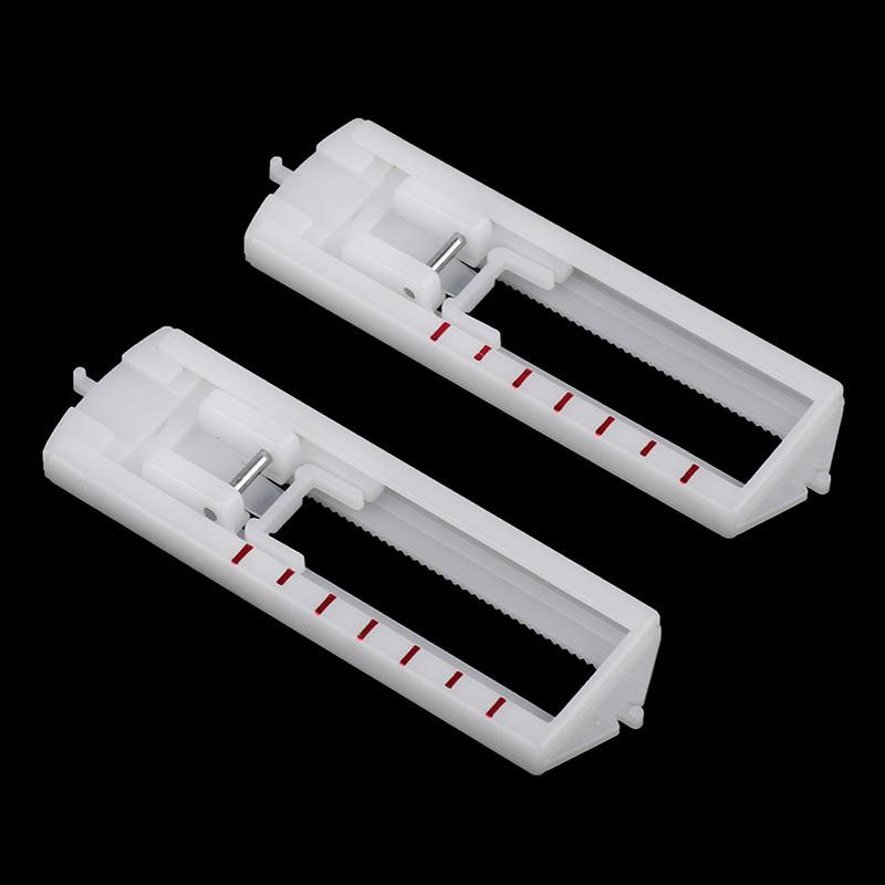 Детали швейной машины Singer. Петля прижимной лапки. Кнопка на отверстии для пуговицы.