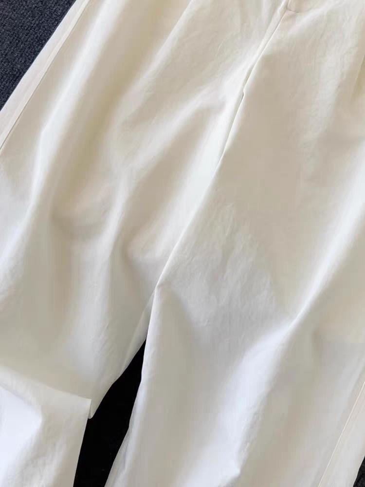 CHAO-Level Casual Wide-Leg Pants for Women: Minimalist Style with Contrasting Waistband and Curved Leg Design