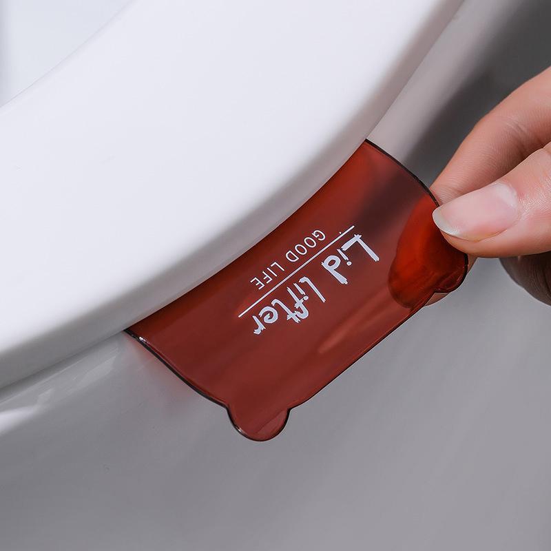 Прозрачный подъемник сиденья унитаза Подъемник крышки унитаза Избегайте прикосновения к ручке крышки