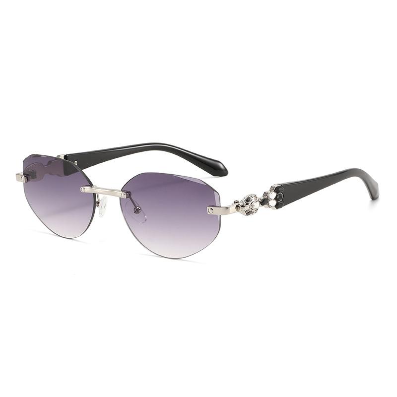 European and American frameless oval cat eye sunglasses women's square and round face thin fashion glasses gem-set diamond light luxury sunglasses