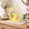 Easter decoration - bunny under the arch with a yellow Easter egg