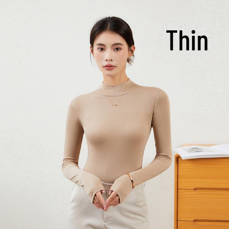 Женская облегающая рубашка с длинным рукавом и полуводолазкой — незаменимый предмет гардероба на осень/зиму в черном или белом цвете