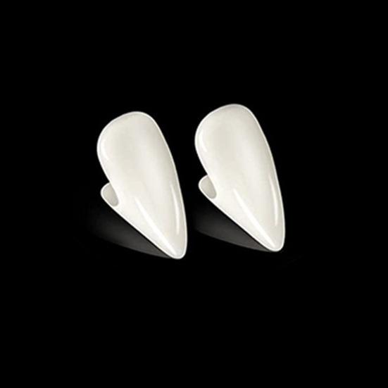 Яркие протезы на Хэллоуин выделяются реалистичными зубами. Сложная имитация протеза широкого применения.