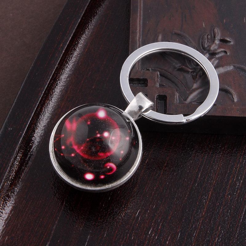 Светящийся брелок с кристаллами Скорпиона и Девы: Металлический брелок с двухсторонней стеклянной подвеской