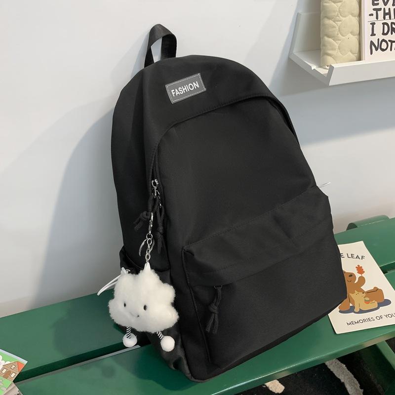 The Schoolbag Is Fresh and Sweet, and the Solid Color Is Versatile and Simple. The Schoolbag for Junior High School Students Is Light