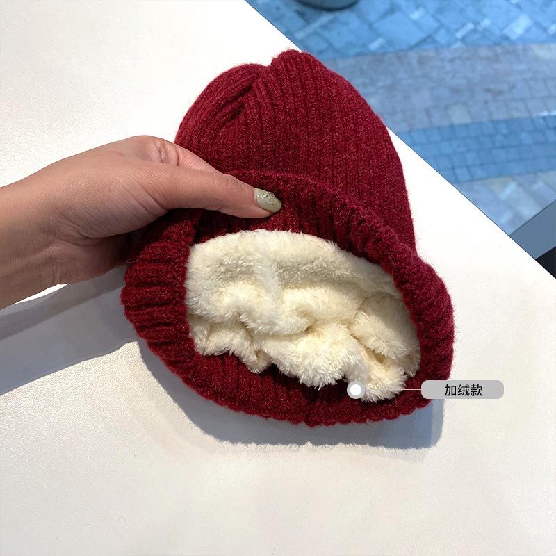 Winter plush thickened wool hat women's solid color pullover knitted hat cycling warm melon rind cold hat couple