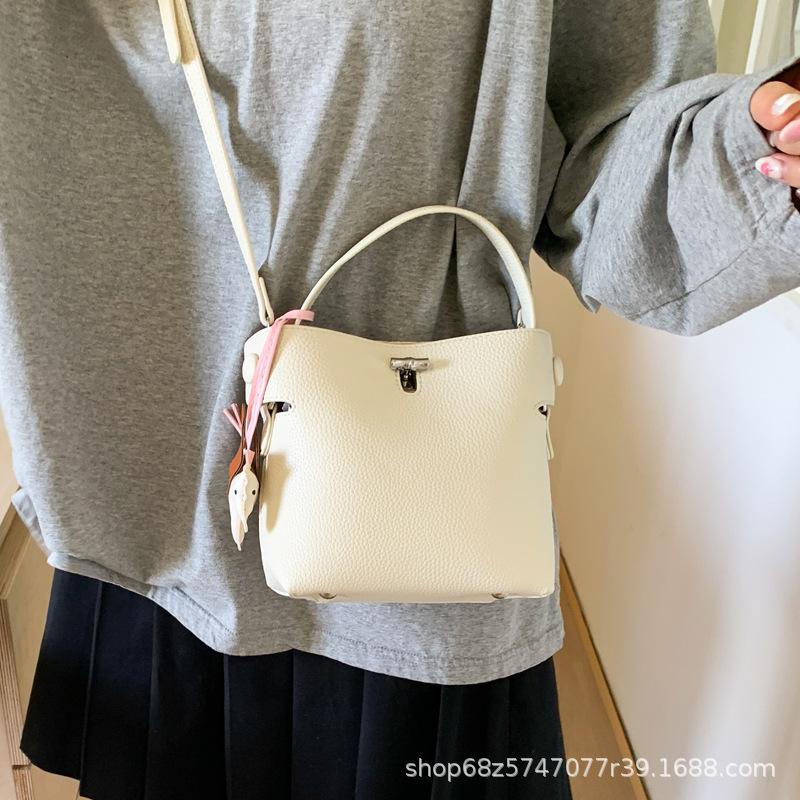 2025 Spring and Summer New Korean Bucket Bag Niche Casual One-shoulder Crossbody Hand-held Commuter High-end Women's Bag