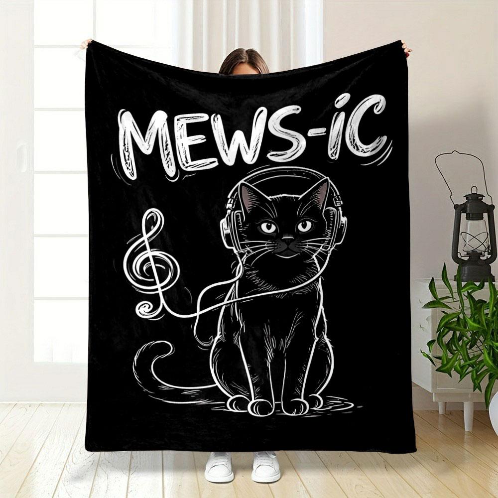 A black cat with headphones and a treble clef-shaped cable, labeled "MEWS-IC". for all seasons blanket lunch break throw gift