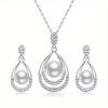 Three-piece set, including a luxurious and elegant minimalist waterdrop design necklace and matching earrings, perfect as a wedding jewelry gift