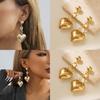 Modern Alloy Heart Pendant Earrings Geometric Gold Heart Studs Trendy Winter 2023 Style