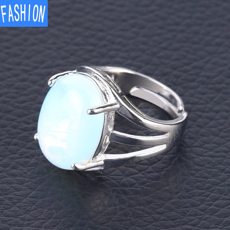 Oval Natural Crystal Four-claw Inlaid Hollow Ring
