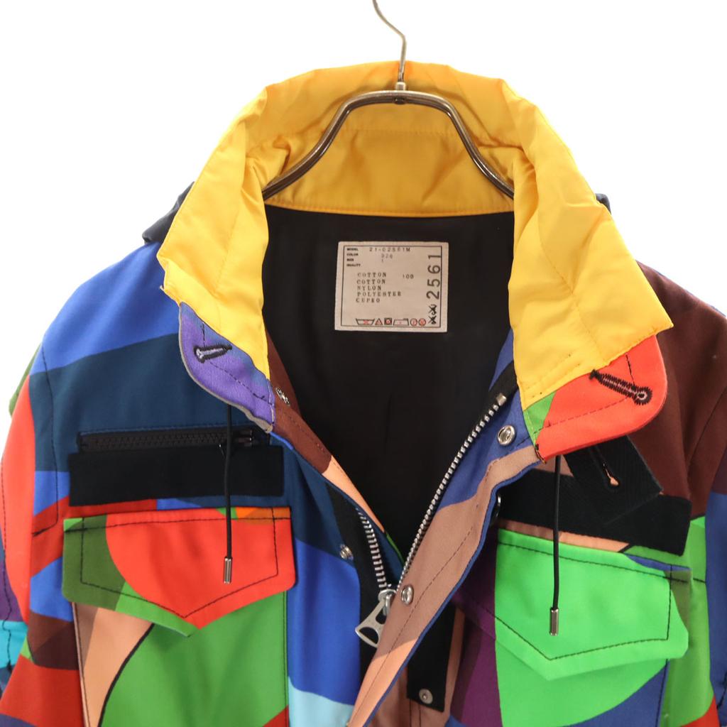 Неиспользованная Sacai 21AW KAWS коллаборация Горная парка 1 Куртка с вешалкой Мужская Б/У
